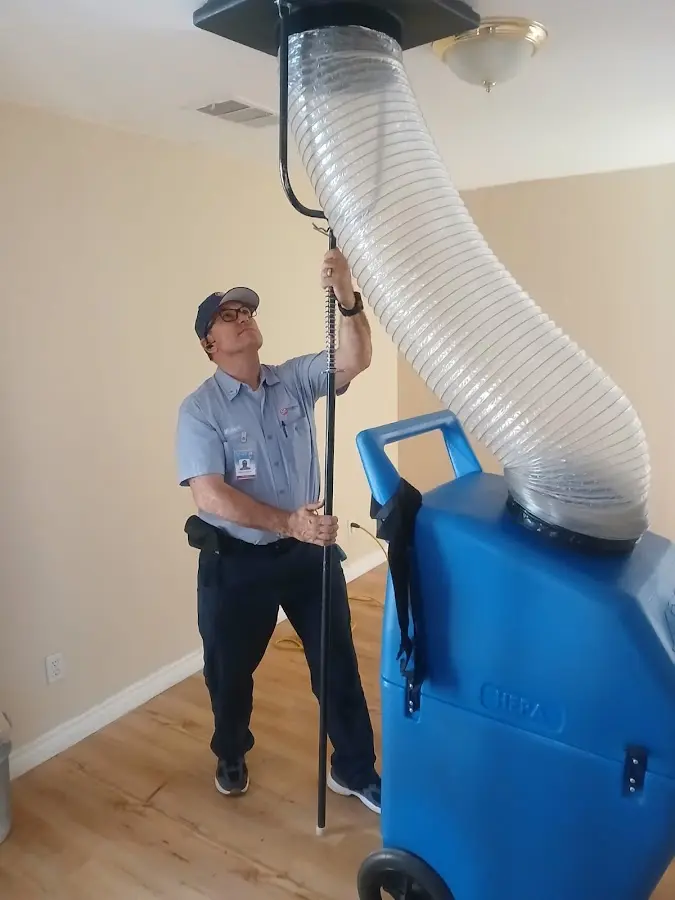 Mini Split Installation technician using HEPA equipment in Poway